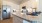 a kitchen with white cabinets