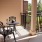 patio with chairs and sunshine