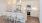 a kitchen with white cabinets